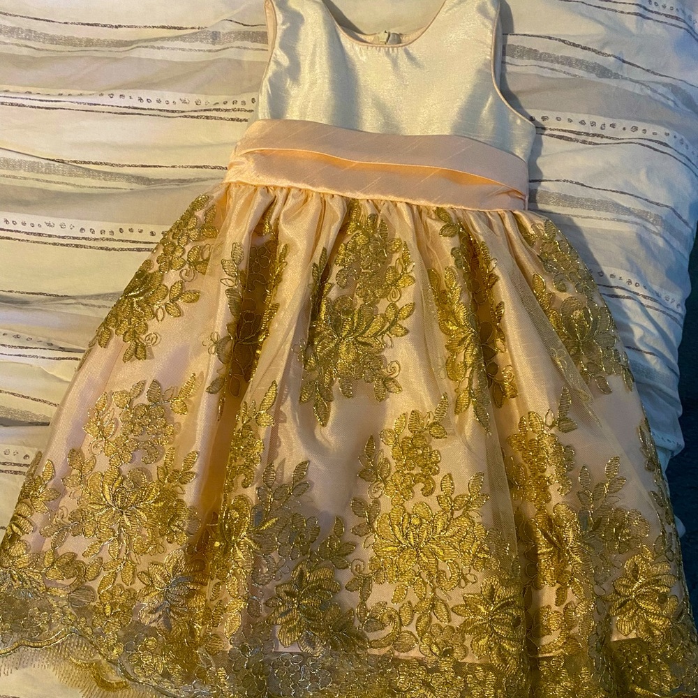 A formal sleeveless dress that flares
